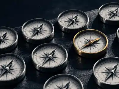 Model risk and drift represented by one compass diverging from a group.